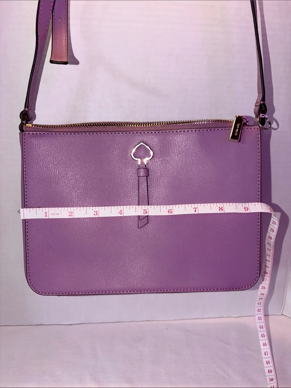 kate spade purple crossbody bag with gold-tone spade charm